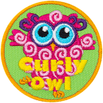 This pink owl has curls all over their body. The words Curly Owl are across the bottom.