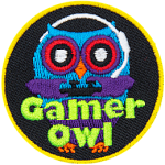 A blue owl holds a black controller. The words Gamer Owl are across the bottom.