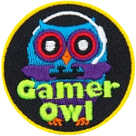 A blue owl holds a black controller. The words Gamer Owl are across the bottom.