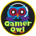 A blue owl holds a black controller. The words Gamer Owl are across the bottom.