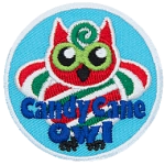 A red, green and white striped owl made to look like a Candy Cane with the words Candy Cane Owl below.