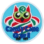 A red, green and white striped owl made to look like a Candy Cane with the words Candy Cane Owl below.