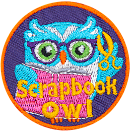 This circular patch shows a bespectacled owl holding scissors in one wing and a scrapbook in the other. The words Scrapbook Owl are at the bottom.