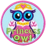 This regal princess owl wears a golden crown, necklace, and a beautiful pink dress.
