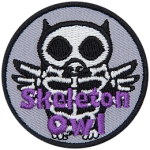 This circular badge displays the outline of an owl with its skeleton showing. The text Skeleton Owl is at the bottom.