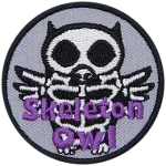 This circular badge displays the outline of an owl with its skeleton showing. The text Skeleton Owl is at the bottom.