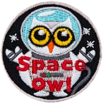 This round patch shows an owl in an astronaut's space suit floating amongst the stars. The words Space Owl are at the bottom.