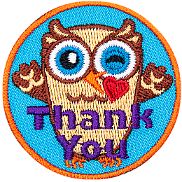 An owl raises its wings in the air, winks, and kisses a heart towards the viewer. The text Thank You is at the bottom of this round crest.