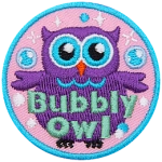 A purple owl stares at the viewer. The words across the bottom read Bubbly Owl.