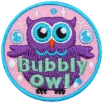 A purple owl stares at the viewer. The words across the bottom read Bubbly Owl.