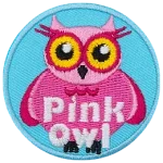 A pink owl with yellow eyes. The words Pink Owl are at the bottom.