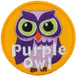 A purple owl with white accents. The words Purple Owl are at the bottom.