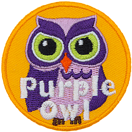 A purple owl with white accents. The words Purple Owl are at the bottom.