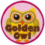 A gold owl with gold eyes. The words Golden Owl are stitched across the bottom half of the patch.