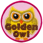 A gold owl with gold eyes. The words Golden Owl are stitched across the bottom half of the patch.