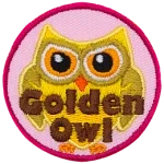 A gold owl with gold eyes. The words Golden Owl are stitched across the bottom half of the patch.