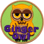 A yellow owl with half-lidded eyes in an unimpressed expression. The words Ginger Owl are at the bottom.