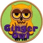 A yellow owl with half-lidded eyes in an unimpressed expression. The words Ginger Owl are at the bottom.