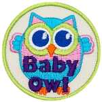 A pink and blue owl with its wings outstretched. The words Baby Owl are at the bottom.