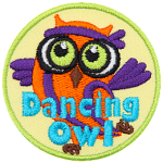 A purple and orange owl with a sweatband. The words Dancing Owl are across the bottom.