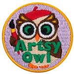 An owl holding a paintbrush and wearing a beret. 