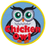 A black and white owl with the words Chicken Owl at the bottom.