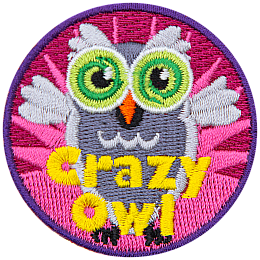 A grey owl with its wings outstretched. The words Crazy Owl are at the bottom.