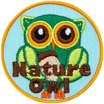 A green owl made from leaves. The words Nature Owl are across the bottom.