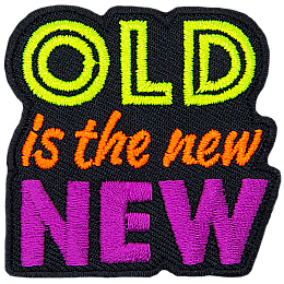 The words Old is the new New are stacked on top of each other and embroidered in neon colours.