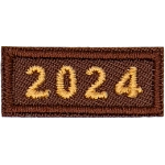 This 1-inch wide by 0.4-inches high rocker forms a straight-edged rectangle. The year number 2024 is embroidered in a bold font.