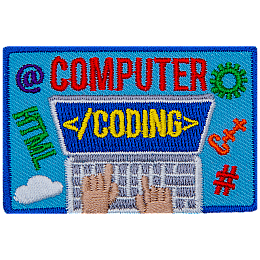 The words Computer Coding are on a top-down view of a laptop.