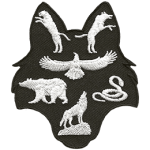 This patch is shaped like a wolf head. A panther and wolf are in the ears, a kite bird, bear, and snake rest in the middle, and a wolf on a rock sits in the snout.