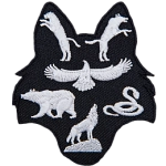 This patch is shaped like a wolf head. A panther and wolf are in the ears, a kite bird, bear, and snake rest in the middle, and a wolf on a rock sits in the snout.