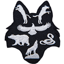 This patch is shaped like a wolf head. A panther and wolf are in the ears, a kite bird, bear, and snake rest in the middle, and a wolf on a rock sits in the snout.