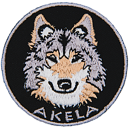 A wolf head with the word Akela below it.