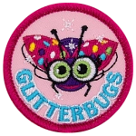 A sparkling ladybug with cartoon eyes and multicoloured spots. The word Glitterbugs is across the bottom.