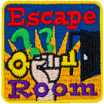 A hand holds a key triumphantly. The words Escape Room are across the top and bottom.