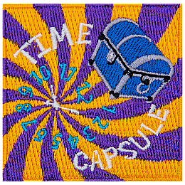 The words time capsule and a blue chest are overtop a swirling purple and orange spiral.