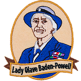 This patch displays a portrait of Lady Olave Baden-Powell wearing a blue and white hat and a blue blazer.