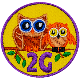 Two owls on a branch above the number and letter 2G.