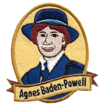 Agnes Baden-Powell inside a vertical oval with a banner that says Agnes Baden-Powell