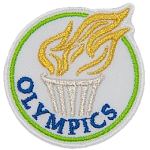 The Olympic torch above the word Olympics.