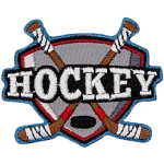 Two hockey sticks are crossed behind the word Hockey.