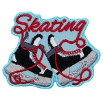 Two black and white hockey skates under red lettered Skating.