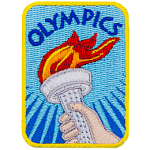 A hand holds a torch below the word Olympic.