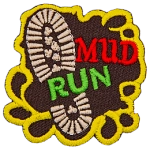 A boot print in the mud with the words Mud Run.