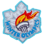 The lit Olympic torch sits on a white snowflake. Winter Olympics is embroidered at the bottom.