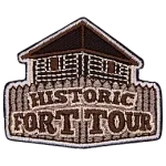 The words Historic Fort Tour on a wooden fort.