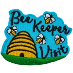 A bee hive sits on a grassy field. Four bees buzz around the words Bee Keeper Visit.