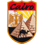 The word Cairo above two pyramids and a camel.